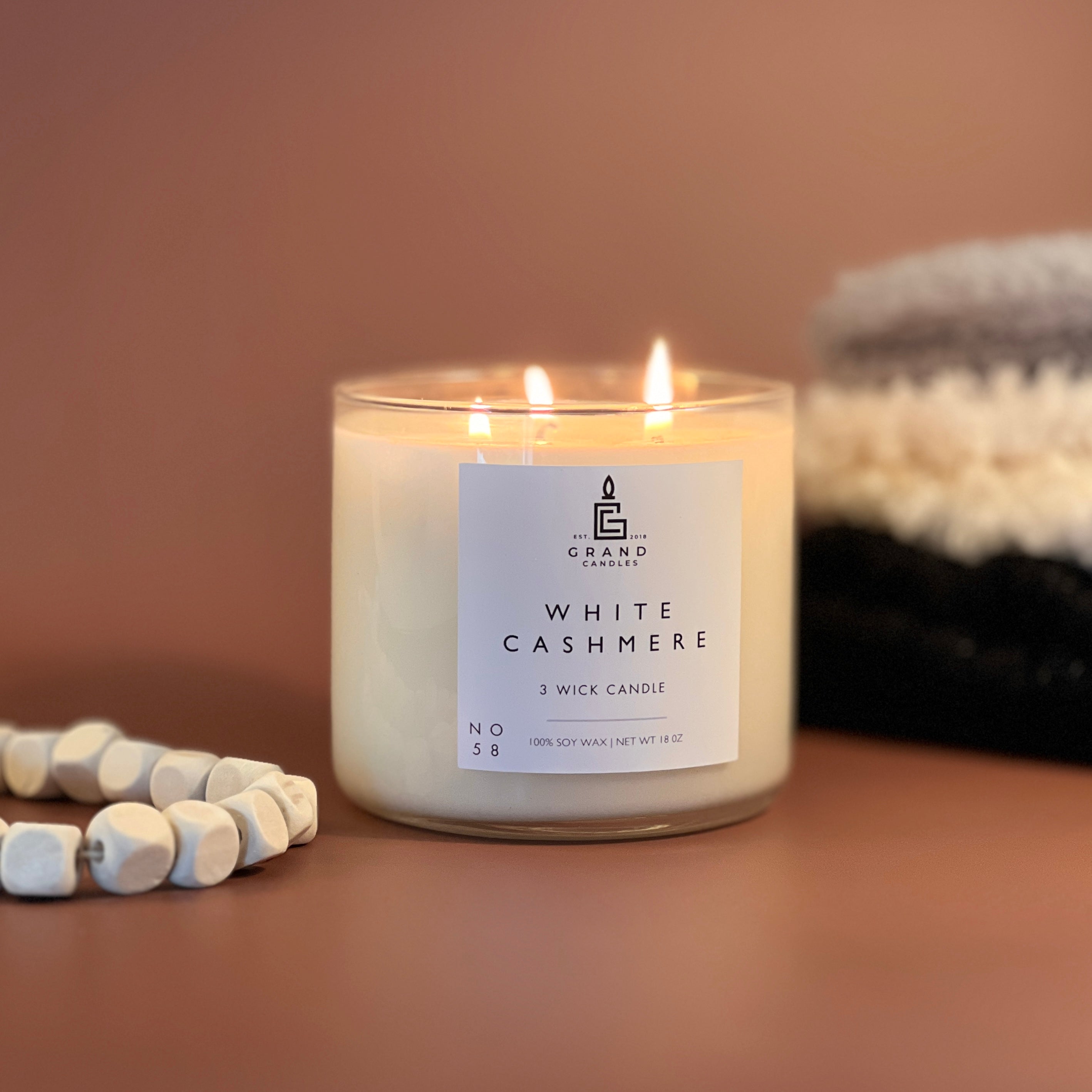 White Cashmere Clear 3 Wick Candle Burning 