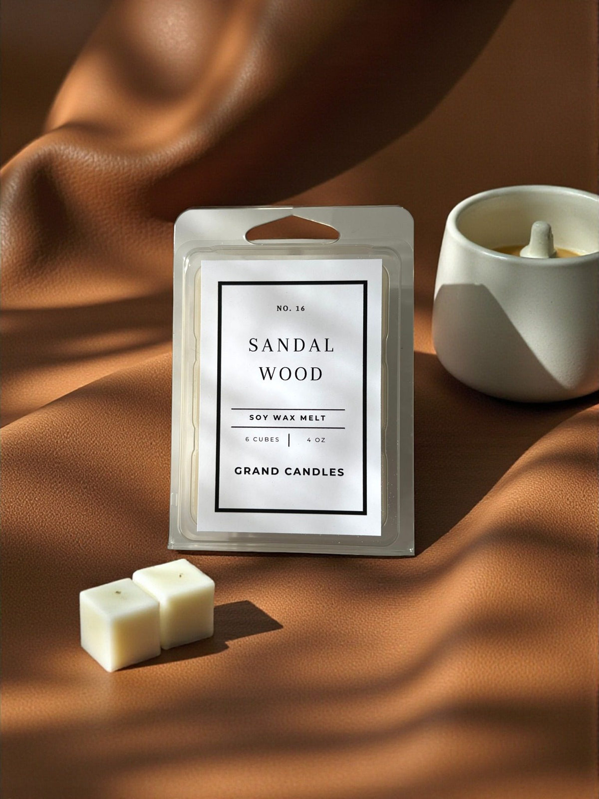 Grand Candles wax melts styled in a home fragrance setting